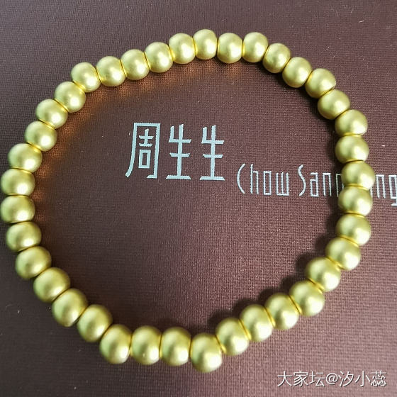 轻似薄纸硬如纲_珠串金