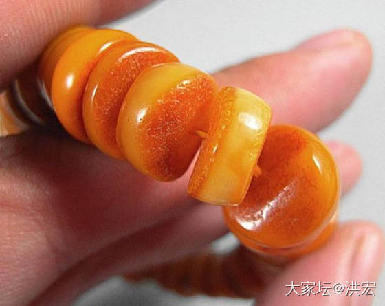 西亚蜜蜡手串带皮问题探讨
