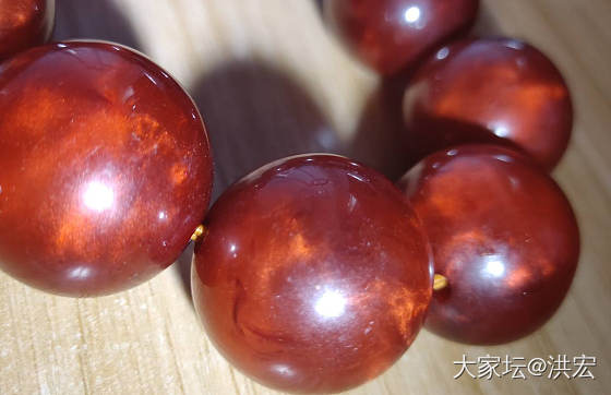 西亚蜜蜡之雪山蜜蜡暨金沙现象在鉴定中运用