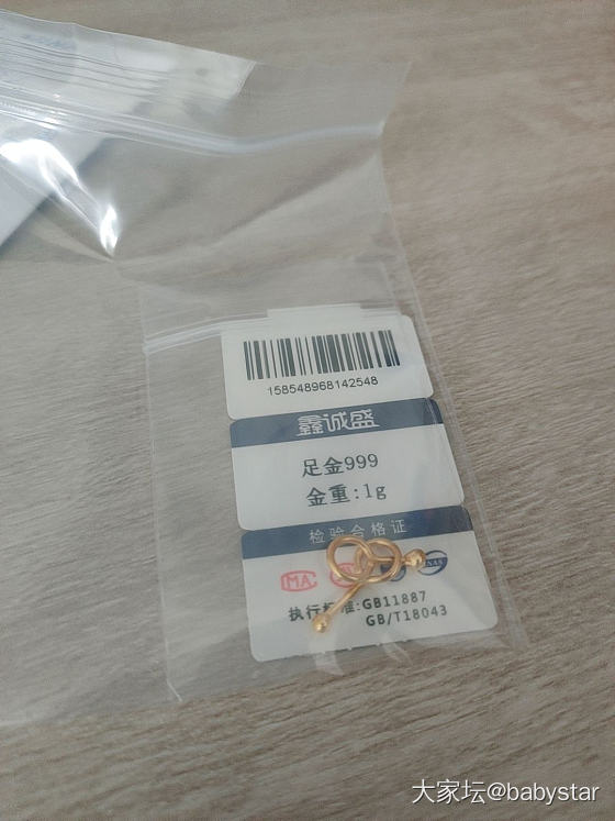 1g的耳钉是真的小_金