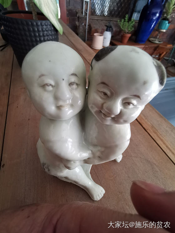 随记：一件白瓷婴戏跤抱塑像的烦恼_收藏