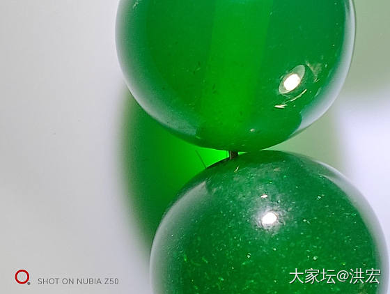 西亚蜜蜡之雪山蜜蜡暨金沙现象在鉴定中运用