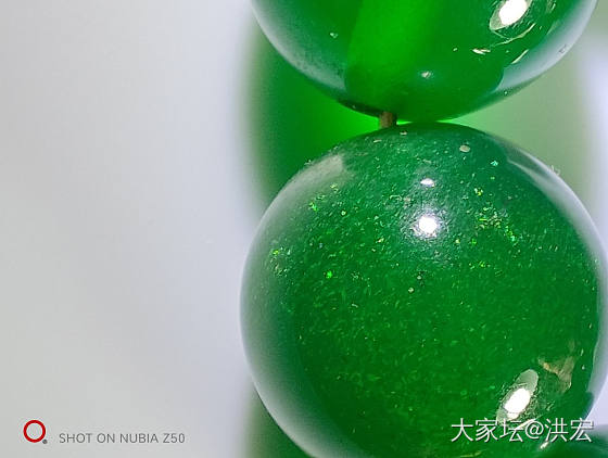 西亚蜜蜡之雪山蜜蜡暨金沙现象在鉴定中运用