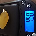 朋友原石磨出来的一些小件蜜蜡和琥珀，打算出，望大家给建议价格！