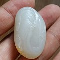 和田籽料关公---墨籽玉。