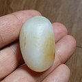 和田籽料关公---墨籽玉。