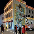 壁画和模特儿对比，你觉得画师画得怎么样？