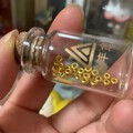 用装金珠的小瓶子压的算盘珠，很匀称，坛友推荐的方法真管用！